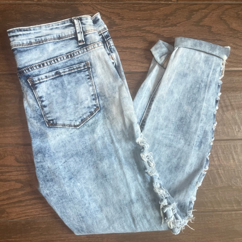 Bleached distressed acid washed blue denim skinny jeans